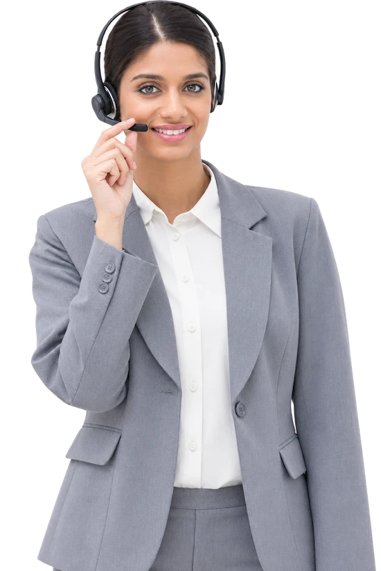 A support agent on a headset, at a customer service desk