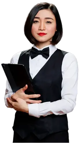 A hotel supervisor in uniform, holding a tablet