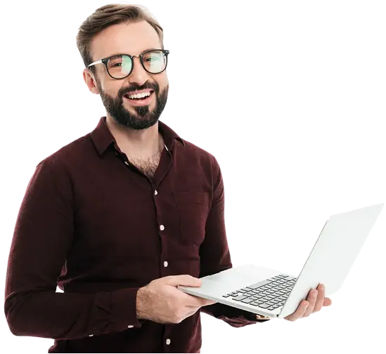A software developer holding an open laptop
